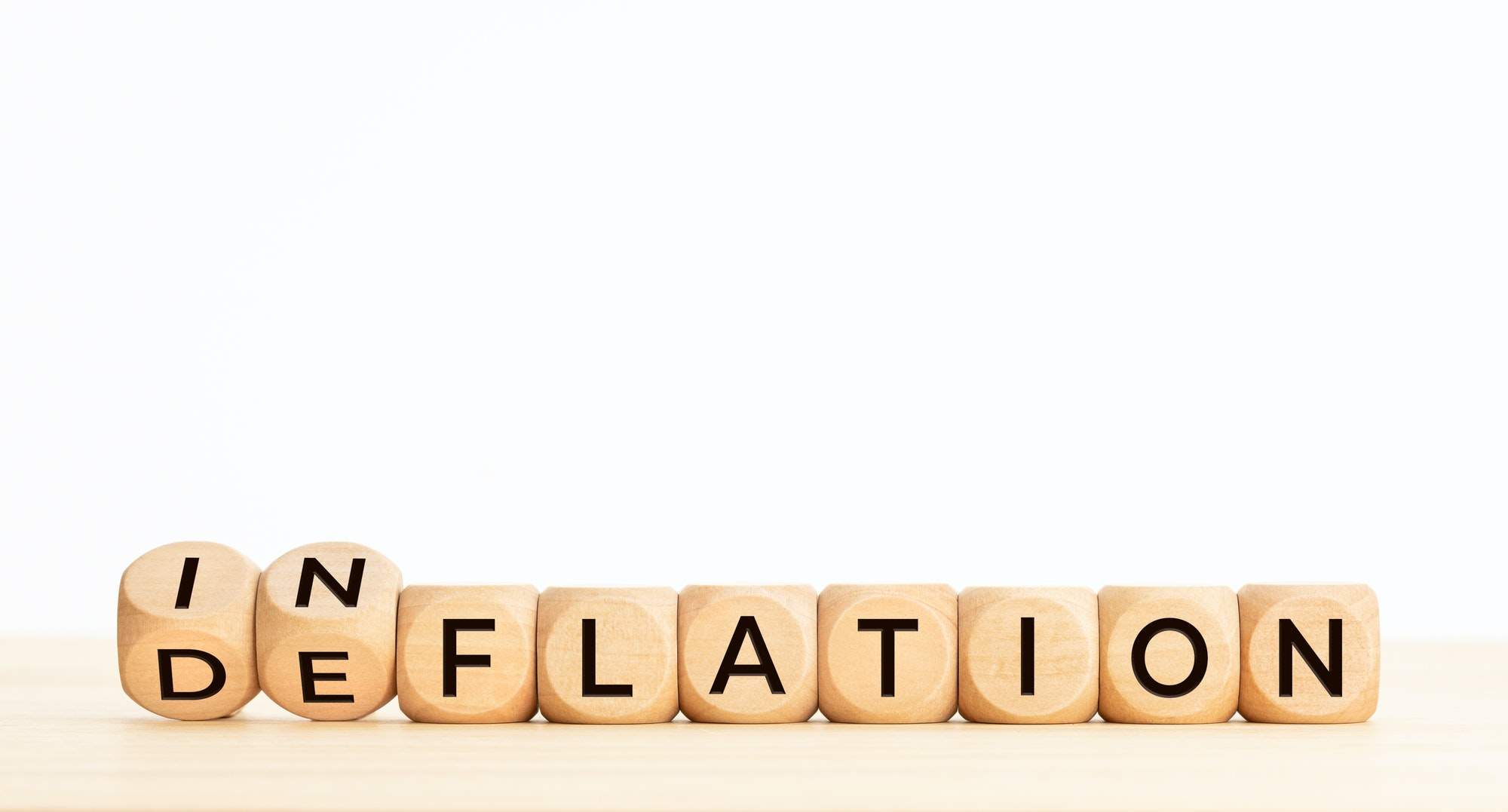 Inflation or deflation word in wooden blocks